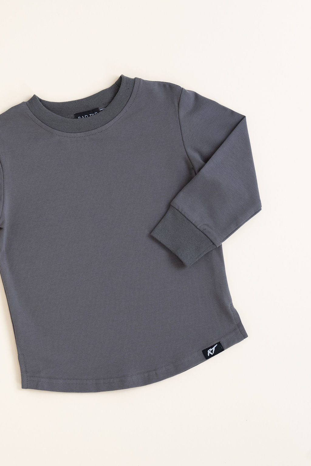 Gray long-sleeve shirt on a white background