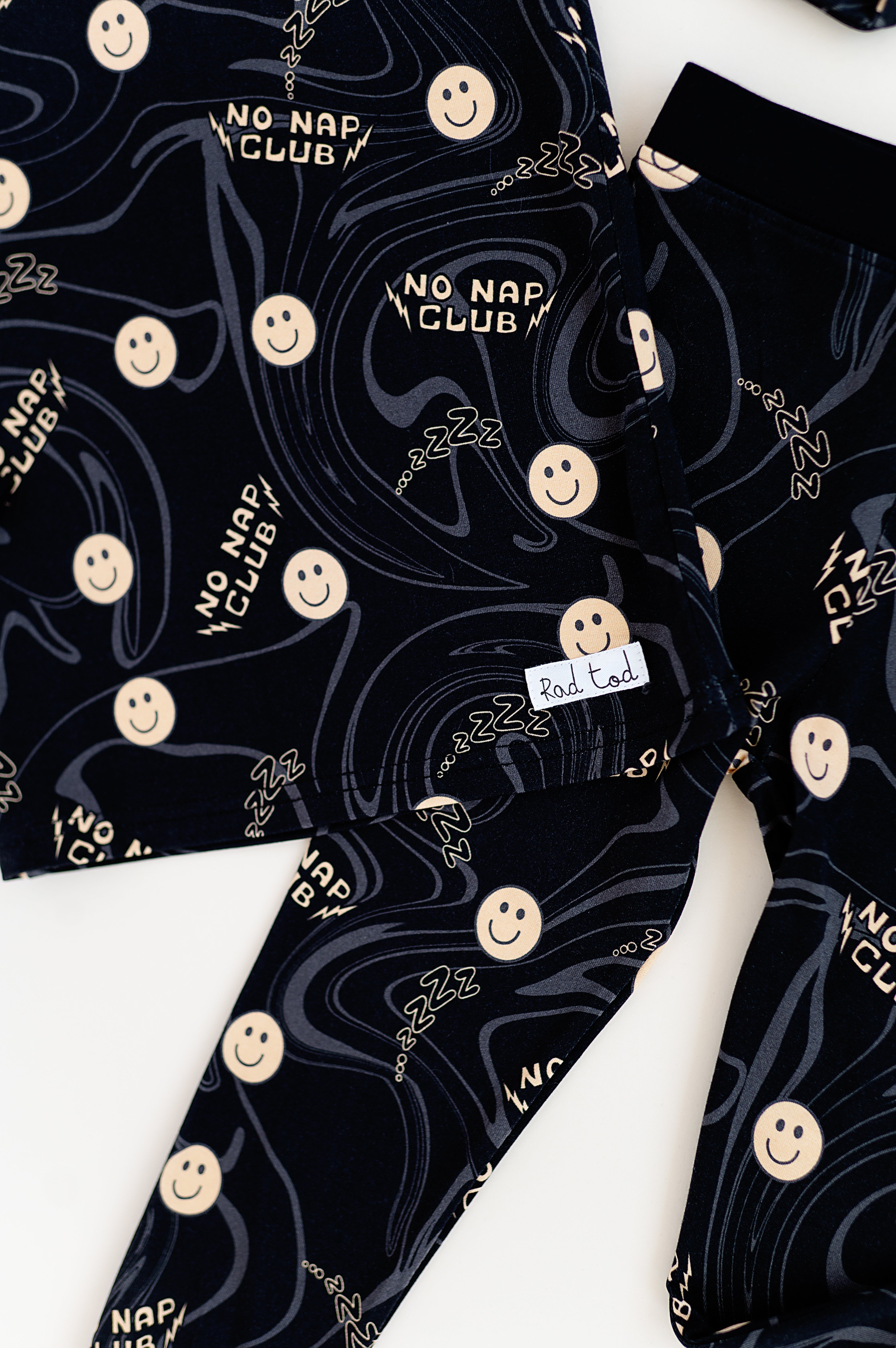 Cute No Nap Club bamboo 2-piece set featuring smiley face graphics and a wavy pattern