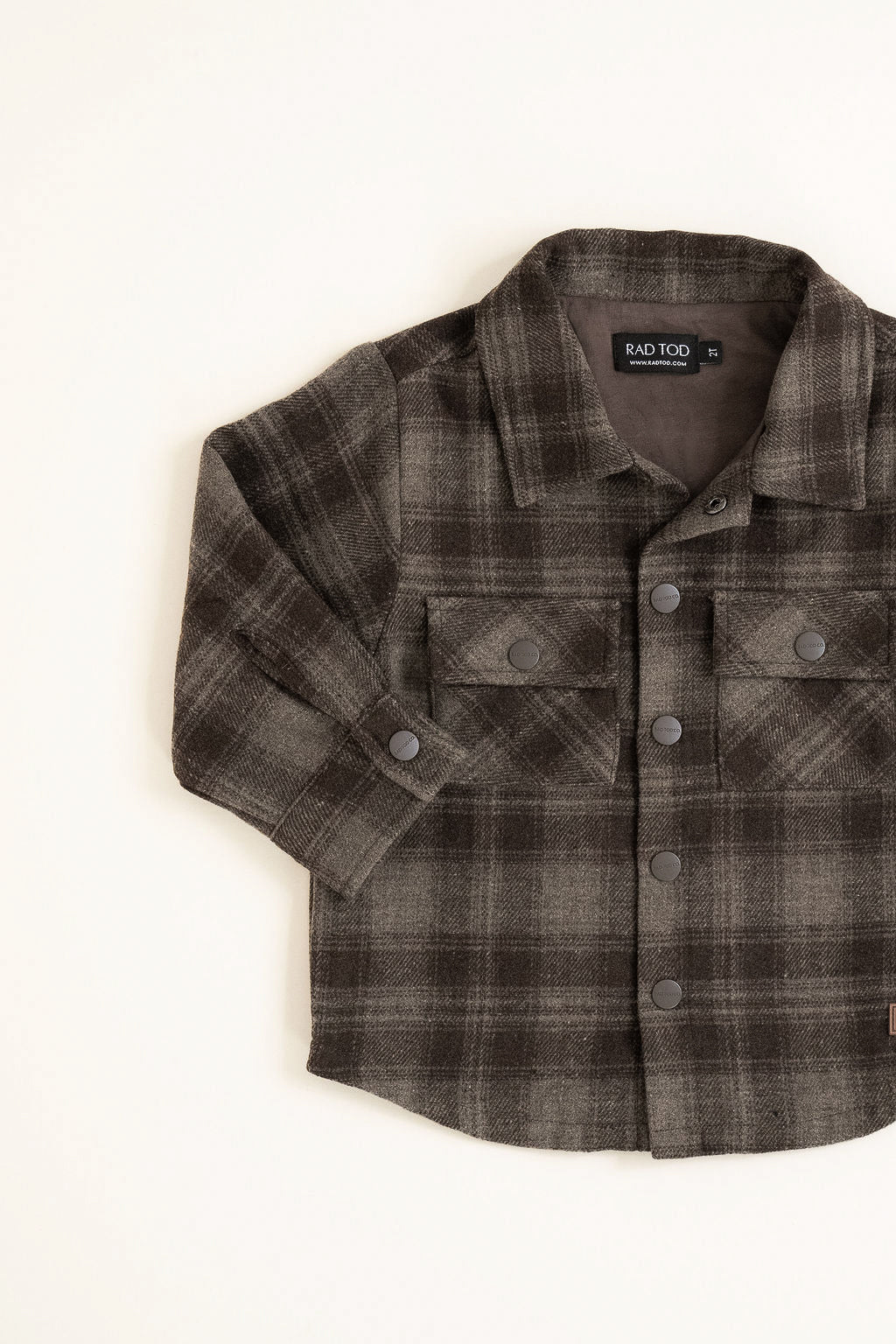 Flat lay of the Espresso Toddler Shacket in medium-weight cotton with soft lining