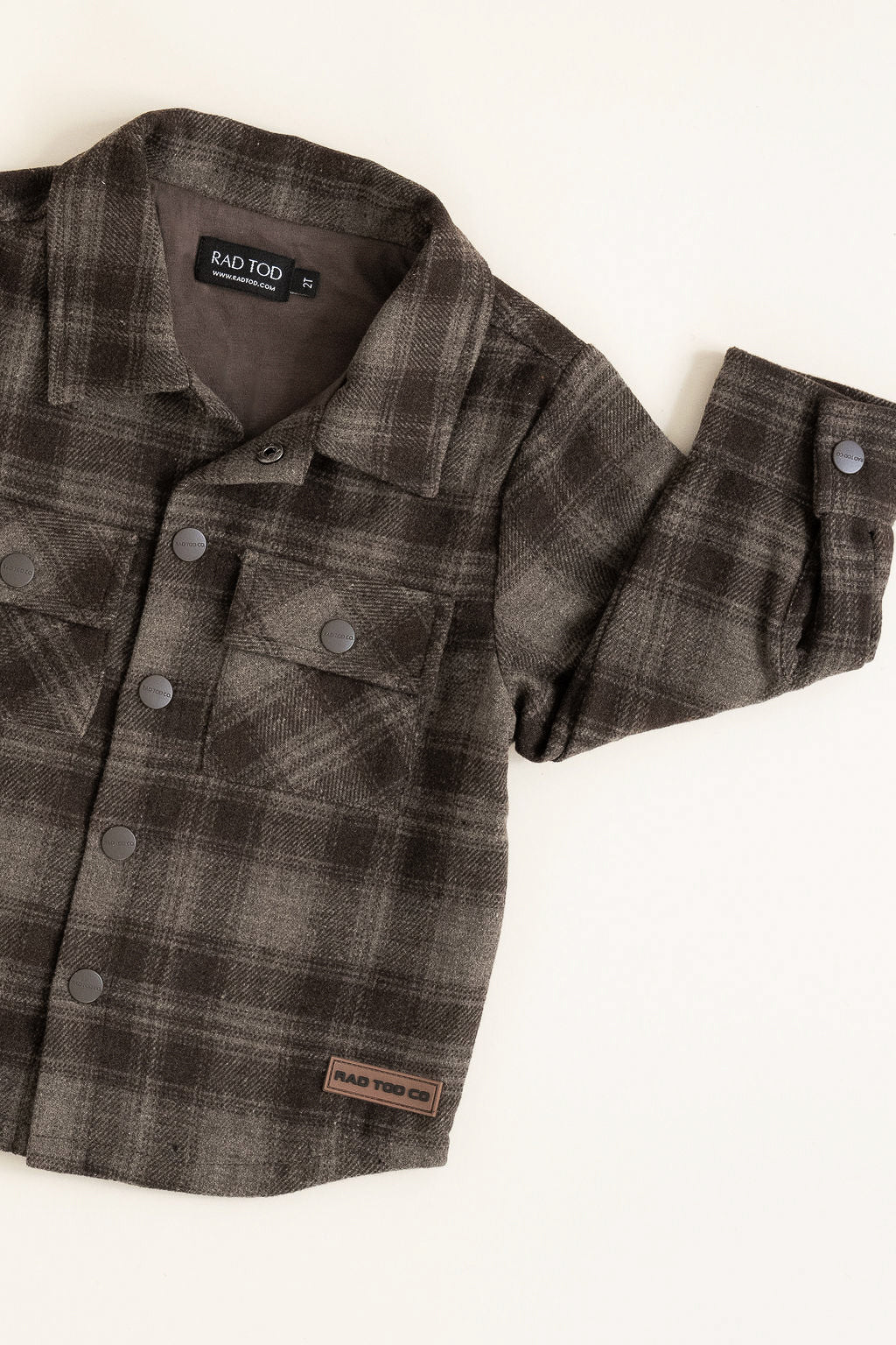 Flat lay of the Espresso Toddler Shacket in medium-weight cotton with soft lining