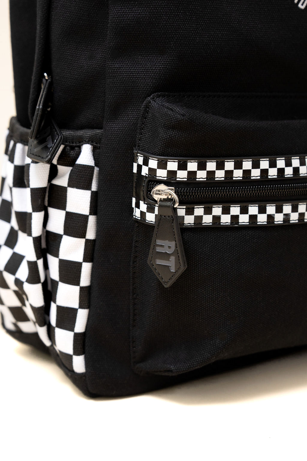Close-up of Fast Lane backpack material and zipper detailing
