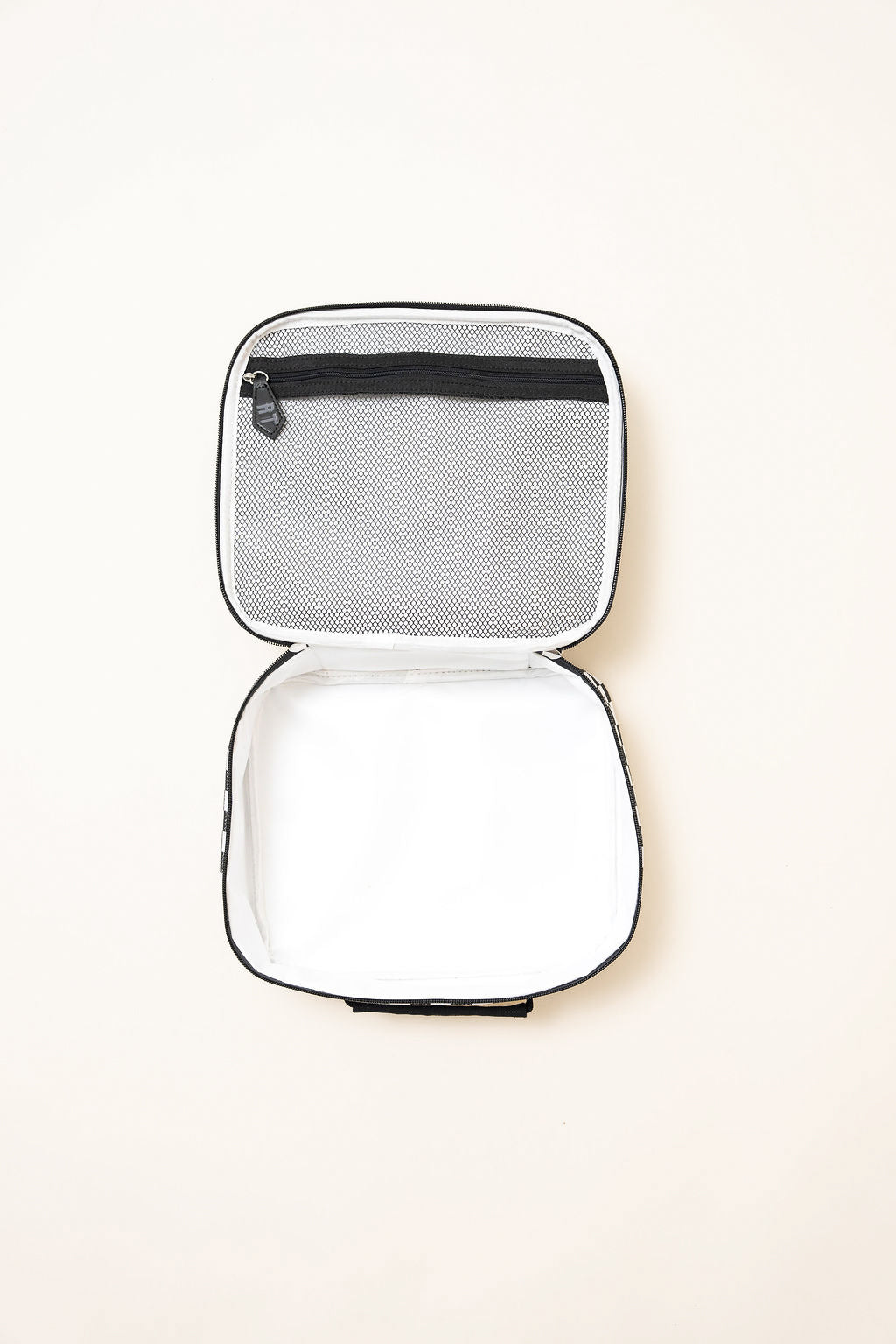 Inside Fast Lane lunchbox showing insulated compartment for snacks and meals
