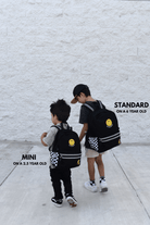 Children wearing Fast Lane backpack with adjustable straps, comfortable everyday fit