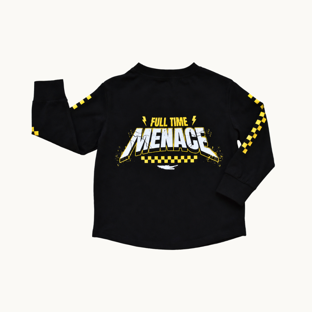 A black long-sleeve t-shirt with a 'FULL TIME MENACE' graphic on the chest and yellow-and-black checkered patterns on the sleeves, displayed flat against a light off-white background.