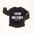 I Do My Own Stunts (Mostly Falls) long sleeve in acid wash black – front vie