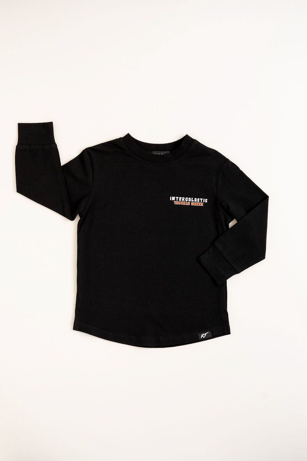 Front view of black Intergalactic Troublemaker long sleeve with beige design