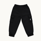 Black cargo jogger pants with elastic waistband and cuffs, featuring side cargo pockets and a small white lightning bolt logo on one pocket, shown flat on a light off-white background.