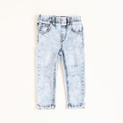 Light blue distressed jeans on a white background
