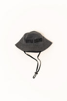 Gray bucket hat with 'LITTLE LEGENDS' text on a white background