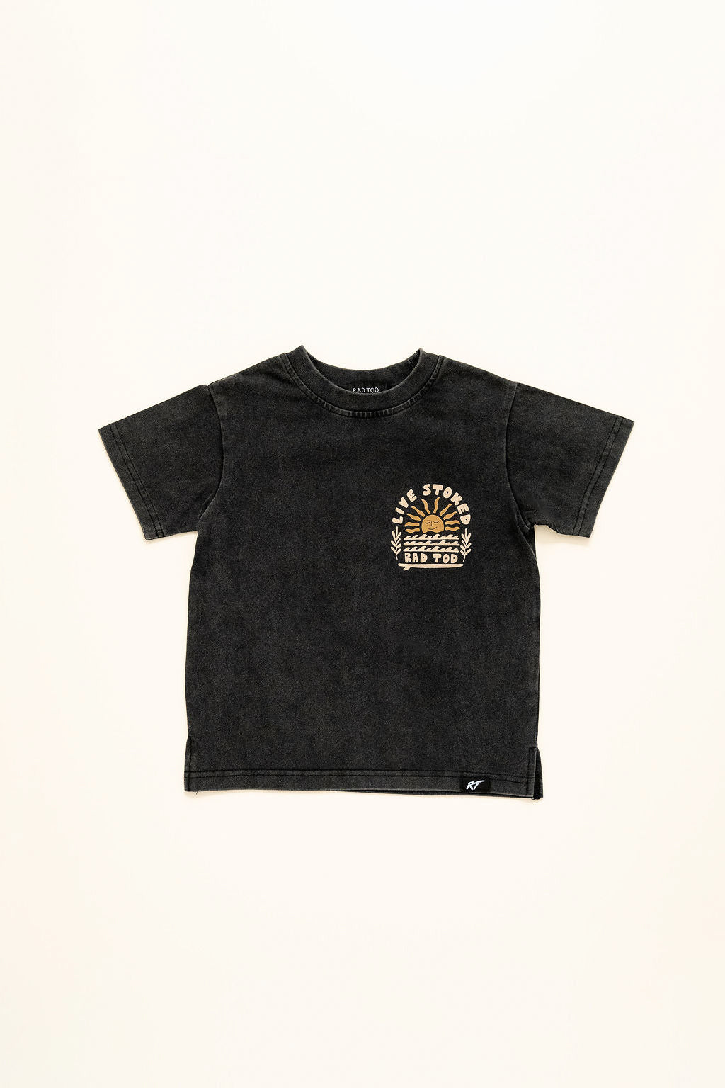 Black acid wash kids t-shirt with Live Stoked golden sun and surfboard graphic front side