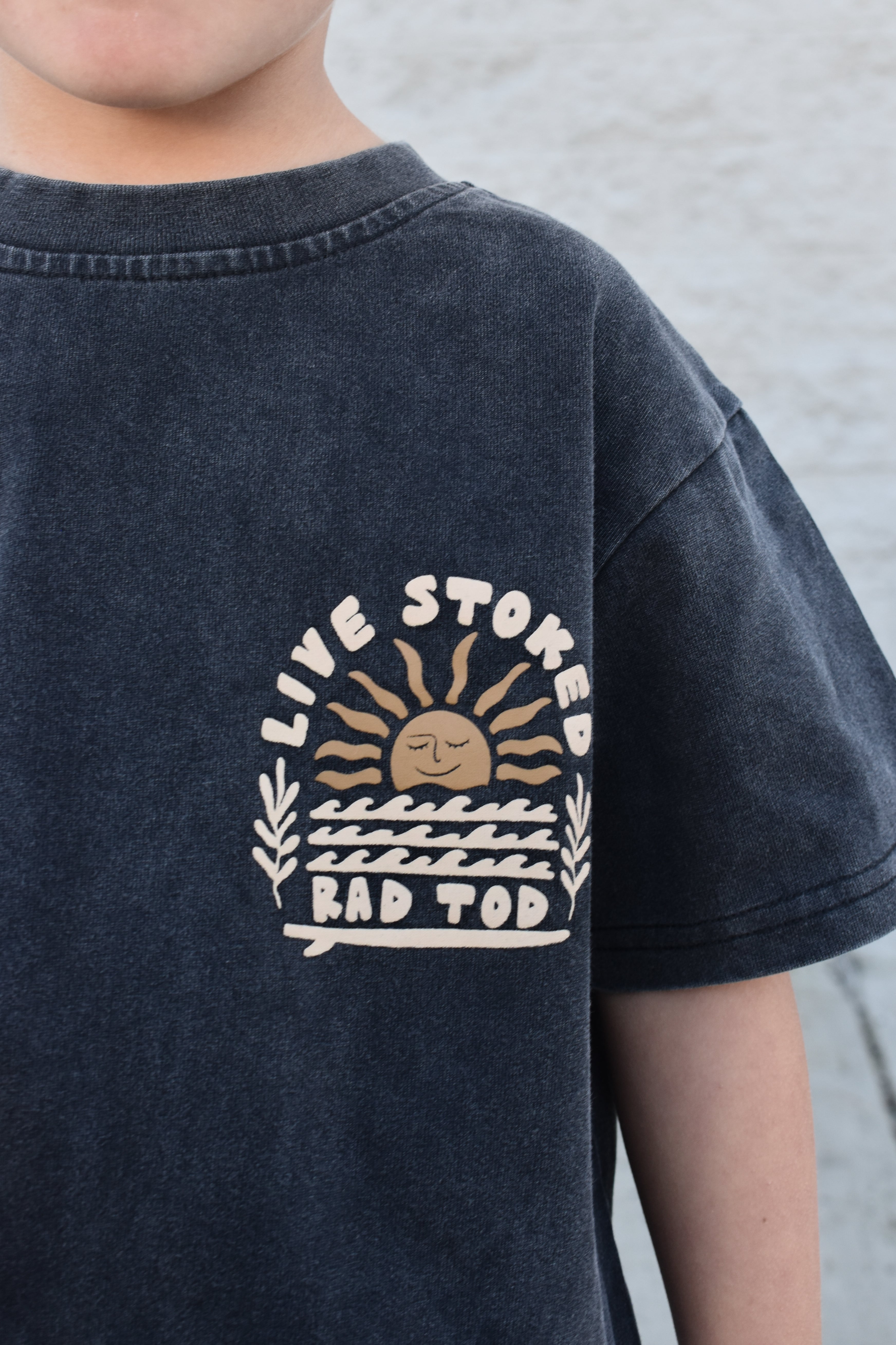 live stoked front side logo, black acid tee