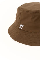 Brown bucket hat with 'RT' logo on a white background