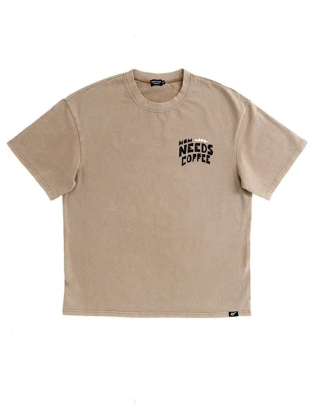 A beige short-sleeve crewneck t-shirt with a black graphic text print on the left chest reading 'MORNING NEEDS COFFEE' with a coffee cup icon, displayed flat against a white background.