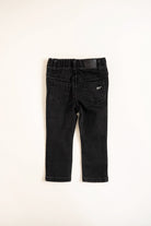 back of Black jeans on a white background