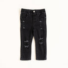Black distressed jeans on a white background