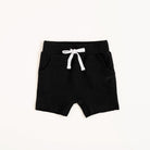 Flat lay of Onyx toddler shorts from the Core Collection with adjustable waistband and front pockets.