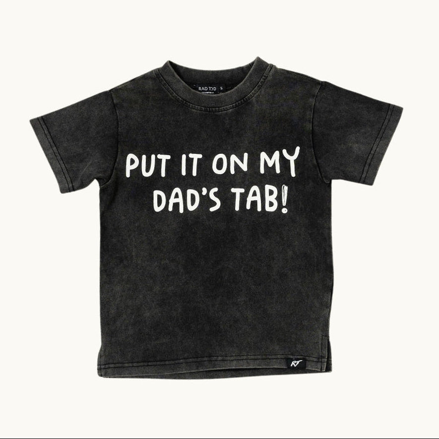 Black t-shirt with white text 'PUT IT ON MY DAD'S TAB!' on a white background