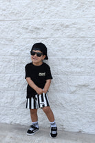 Kids Riviera Stripe Shorts in black with stripe detail made from soft bamboo cotton blend, breathable and comfortable for all-day wear