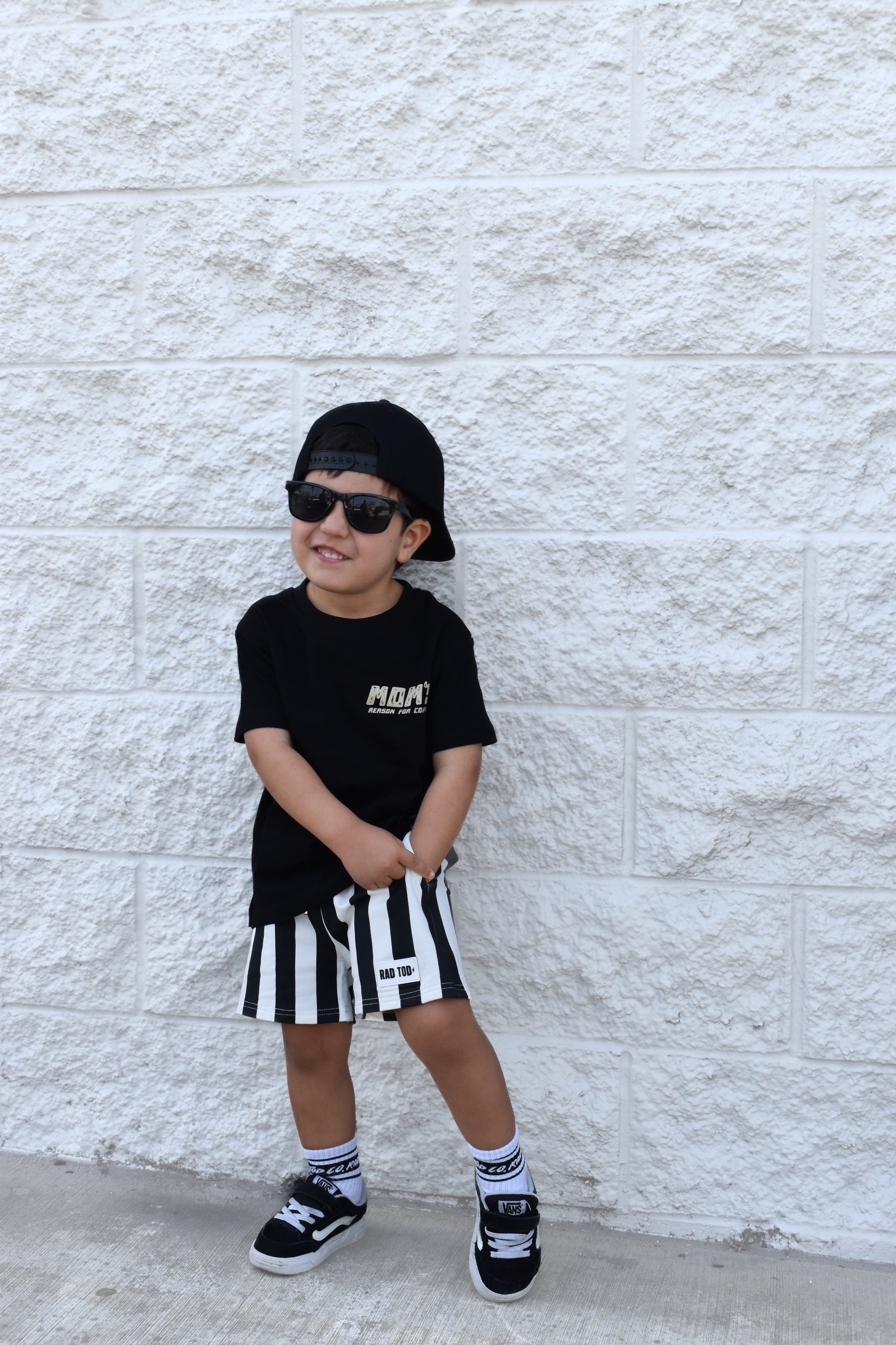 Kids Riviera Stripe Shorts in black with stripe detail made from soft bamboo cotton blend, breathable and comfortable for all-day wear