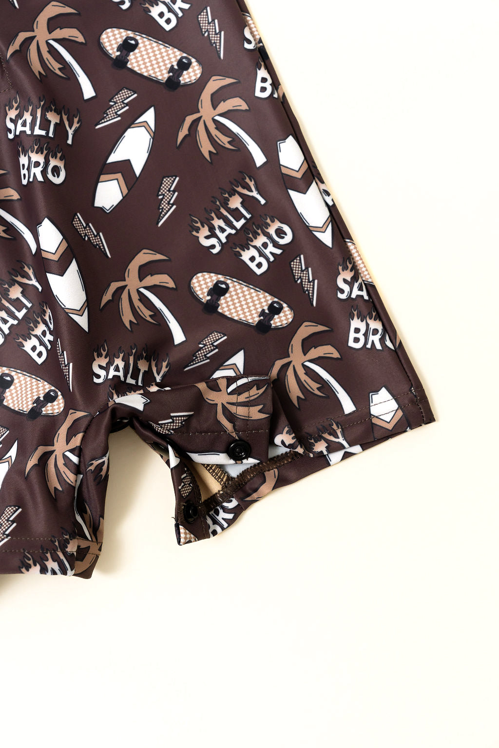 Salty Bro kids rashguard onesie with snap bottom closure